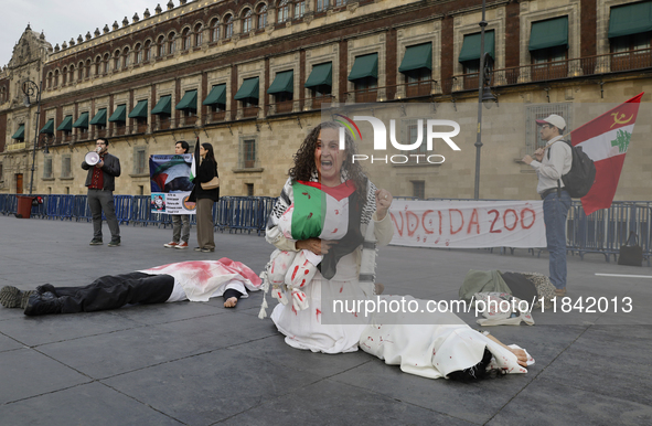 Palestinian activists and supporters demonstrate against the genocide in Gaza in the Zocalo of Mexico City, Mexico, on December 6, 2024, to...