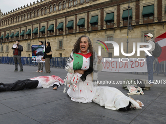 Palestinian activists and supporters demonstrate against the genocide in Gaza in the Zocalo of Mexico City, Mexico, on December 6, 2024, to...