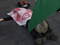 Palestinian activists and supporters demonstrate against the genocide in Gaza in the Zocalo of Mexico City, Mexico, on December 6, 2024, to...