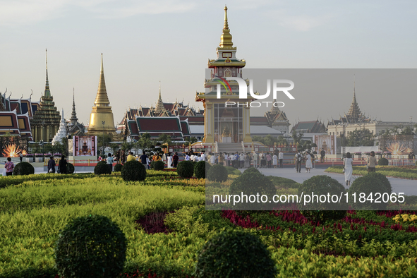 Buddhists and devotees pay homage to the Buddha's sacred tooth relics, which are temporarily enshrined in Thailand at the Sanam Luang ceremo...