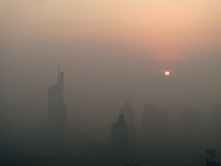 Buildings loom under heavy fog in Nanjing, China, on December 7, 2024. (