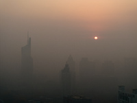 Buildings loom under heavy fog in Nanjing, China, on December 7, 2024. (