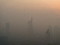 Buildings loom under heavy fog in Nanjing, China, on December 7, 2024. (