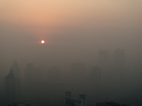 Buildings loom under heavy fog in Nanjing, China, on December 7, 2024. (