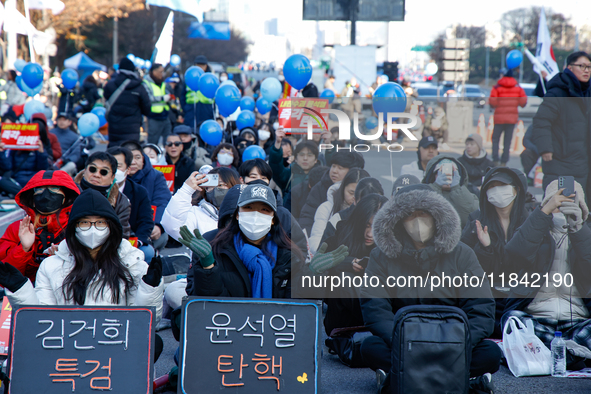 Citizens gather in Yeouido, South Korea, on December 7, 2024, to demand the impeachment and resignation of President Yoon Suk Yeol. Yoon's a...