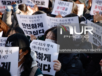 Hundreds of students from the National University Student Union gather in Yeouido, South Korea, on December 7, 2024, holding placards demand...