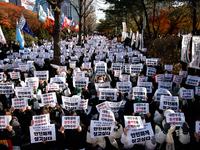 Hundreds of students from the National University Student Union gather in Yeouido, South Korea, on December 7, 2024, holding placards demand...