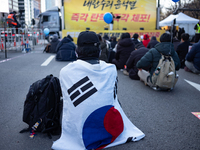 Citizens gather in Yeouido, South Korea, on December 7, 2024, to demand the impeachment and resignation of President Yoon Suk Yeol. Yoon's a...