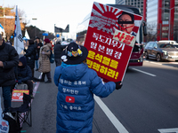 Citizens gather in Yeouido, South Korea, on December 7, 2024, to demand the impeachment and resignation of President Yoon Suk Yeol. Yoon's a...