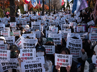 Hundreds of students from the National University Student Union gather in Yeouido, South Korea, on December 7, 2024, holding placards demand...