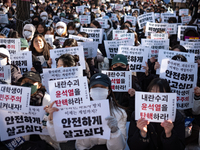 Hundreds of students from the National University Student Union gather in Yeouido, South Korea, on December 7, 2024, holding placards demand...