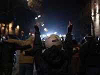 Anti-government protesters face police during a ninth consecutive day of mass demonstrations against the government's postponement of Europe...