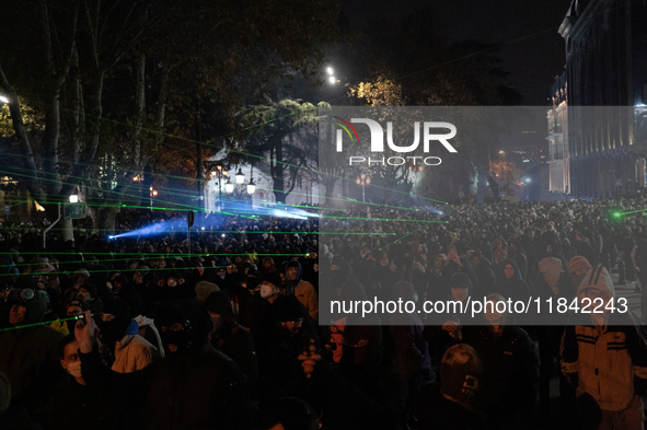 Anti-government protesters rally outside the parliament building during a ninth consecutive day of mass demonstrations against the governmen...