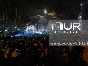 Anti-government protesters rally outside the parliament building during a ninth consecutive day of mass demonstrations against the governmen...