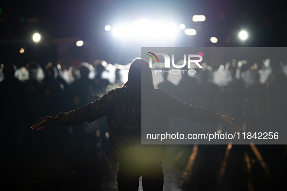 Anti-government protesters face police during a ninth consecutive day of mass demonstrations against the government's postponement of Europe...