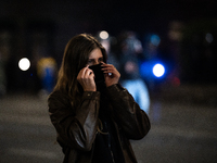 Anti-government protesters face police during a ninth consecutive day of mass demonstrations against the government's postponement of Europe...