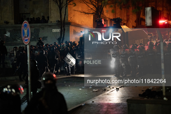 Police disperse anti-government protesters during a ninth consecutive day of mass demonstrations against the government's postponement of Eu...