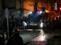 Police disperse anti-government protesters during a ninth consecutive day of mass demonstrations against the government's postponement of Eu...