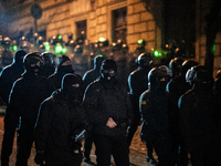 Police disperse anti-government protesters during a ninth consecutive day of mass demonstrations against the government's postponement of Eu...