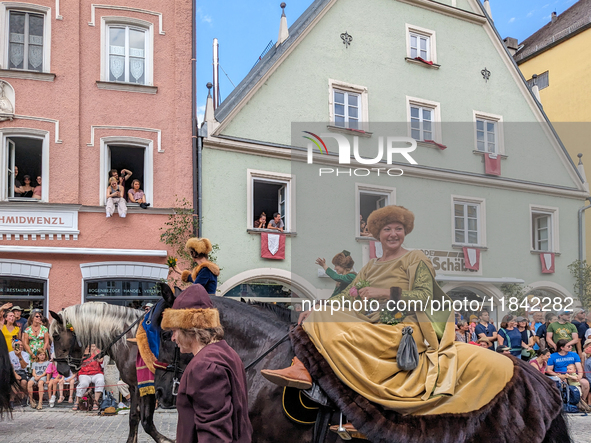 Over 2,000 participants recreate the medieval wedding of Hedwig Jagiellon and George of Bavaria. On July 16, 2023, in Landshut, Bavaria, Ger...