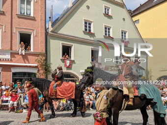 Over 2,000 participants recreate the medieval wedding of Hedwig Jagiellon and George of Bavaria. On July 16, 2023, in Landshut, Bavaria, Ger...