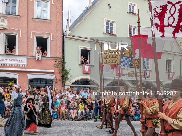 Over 2,000 participants recreate the medieval wedding of Hedwig Jagiellon and George of Bavaria. On July 16, 2023, in Landshut, Bavaria, Ger...