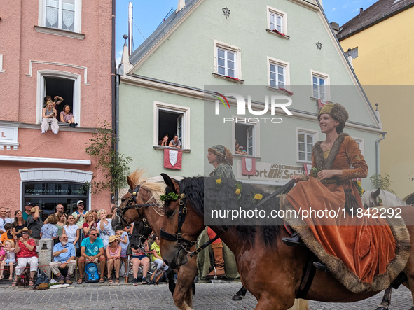 Over 2,000 participants recreate the medieval wedding of Hedwig Jagiellon and George of Bavaria. On July 16, 2023, in Landshut, Bavaria, Ger...