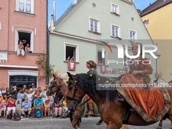 Over 2,000 participants recreate the medieval wedding of Hedwig Jagiellon and George of Bavaria. On July 16, 2023, in Landshut, Bavaria, Ger...