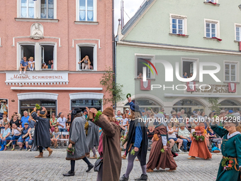 Over 2,000 participants recreate the medieval wedding of Hedwig Jagiellon and George of Bavaria. On July 16, 2023, in Landshut, Bavaria, Ger...