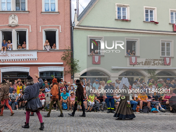 Over 2,000 participants recreate the medieval wedding of Hedwig Jagiellon and George of Bavaria. On July 16, 2023, in Landshut, Bavaria, Ger...