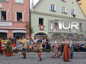 Over 2,000 participants recreate the medieval wedding of Hedwig Jagiellon and George of Bavaria. On July 16, 2023, in Landshut, Bavaria, Ger...