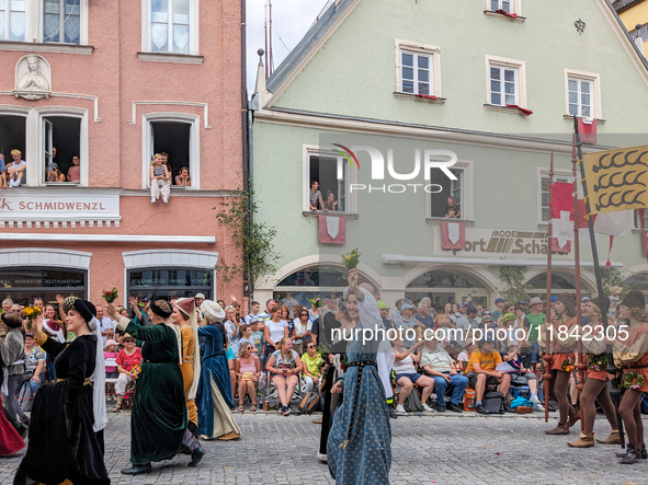 Over 2,000 participants recreate the medieval wedding of Hedwig Jagiellon and George of Bavaria. On July 16, 2023, in Landshut, Bavaria, Ger...