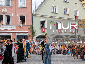 Over 2,000 participants recreate the medieval wedding of Hedwig Jagiellon and George of Bavaria. On July 16, 2023, in Landshut, Bavaria, Ger...