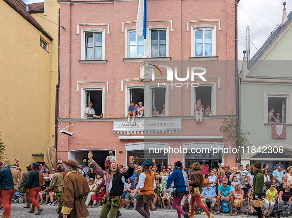 Over 2,000 participants recreate the medieval wedding of Hedwig Jagiellon and George of Bavaria. On July 16, 2023, in Landshut, Bavaria, Ger...