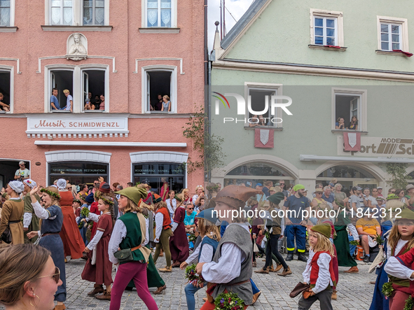 Over 2,000 participants recreate the medieval wedding of Hedwig Jagiellon and George of Bavaria. On July 16, 2023, in Landshut, Bavaria, Ger...