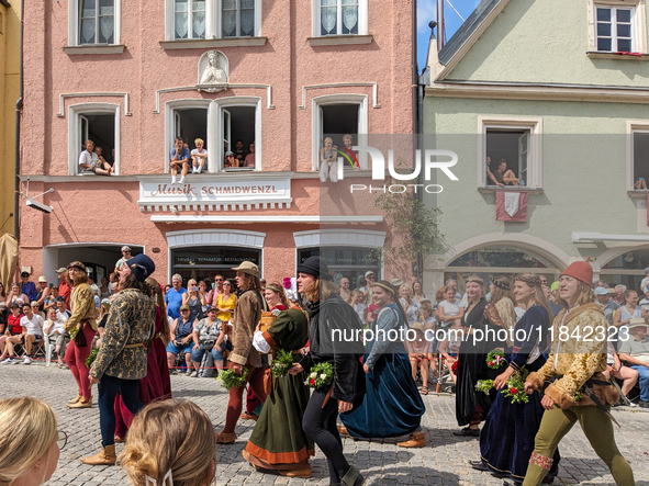 Over 2,000 participants recreate the medieval wedding of Hedwig Jagiellon and George of Bavaria. On July 16, 2023, in Landshut, Bavaria, Ger...