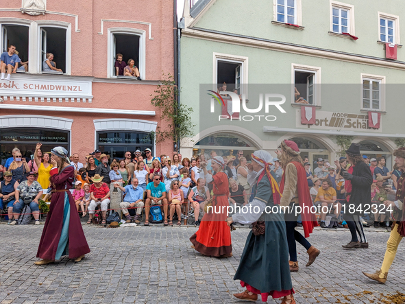 Over 2,000 participants recreate the medieval wedding of Hedwig Jagiellon and George of Bavaria. On July 16, 2023, in Landshut, Bavaria, Ger...