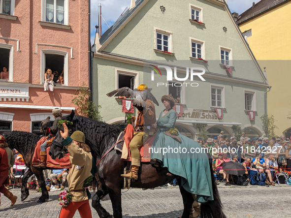 Over 2,000 participants recreate the medieval wedding of Hedwig Jagiellon and George of Bavaria. On July 16, 2023, in Landshut, Bavaria, Ger...