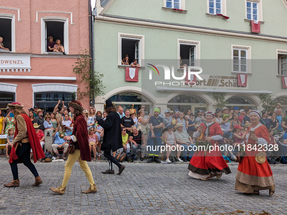 Over 2,000 participants recreate the medieval wedding of Hedwig Jagiellon and George of Bavaria. On July 16, 2023, in Landshut, Bavaria, Ger...