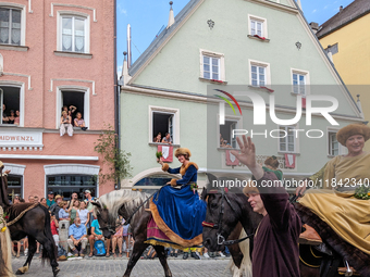 Over 2,000 participants recreate the medieval wedding of Hedwig Jagiellon and George of Bavaria. On July 16, 2023, in Landshut, Bavaria, Ger...