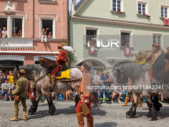 Over 2,000 participants recreate the medieval wedding of Hedwig Jagiellon and George of Bavaria. On July 16, 2023, in Landshut, Bavaria, Ger...