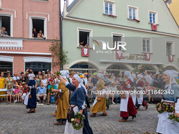 Over 2,000 participants recreate the medieval wedding of Hedwig Jagiellon and George of Bavaria. On July 16, 2023, in Landshut, Bavaria, Ger...