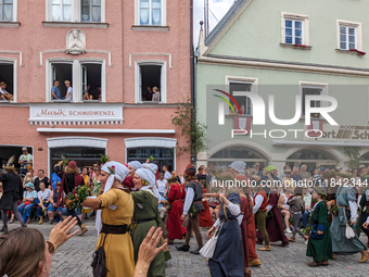 Over 2,000 participants recreate the medieval wedding of Hedwig Jagiellon and George of Bavaria. On July 16, 2023, in Landshut, Bavaria, Ger...