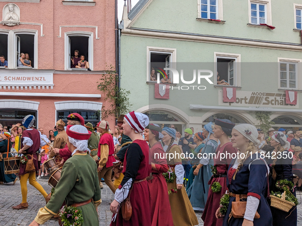 Over 2,000 participants recreate the medieval wedding of Hedwig Jagiellon and George of Bavaria. On July 16, 2023, in Landshut, Bavaria, Ger...