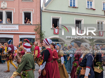 Over 2,000 participants recreate the medieval wedding of Hedwig Jagiellon and George of Bavaria. On July 16, 2023, in Landshut, Bavaria, Ger...