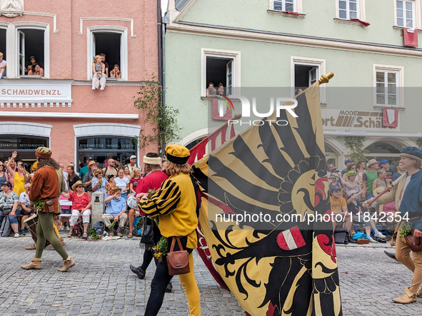 Over 2,000 participants recreate the medieval wedding of Hedwig Jagiellon and George of Bavaria. On July 16, 2023, in Landshut, Bavaria, Ger...