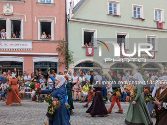 Over 2,000 participants recreate the medieval wedding of Hedwig Jagiellon and George of Bavaria. On July 16, 2023, in Landshut, Bavaria, Ger...