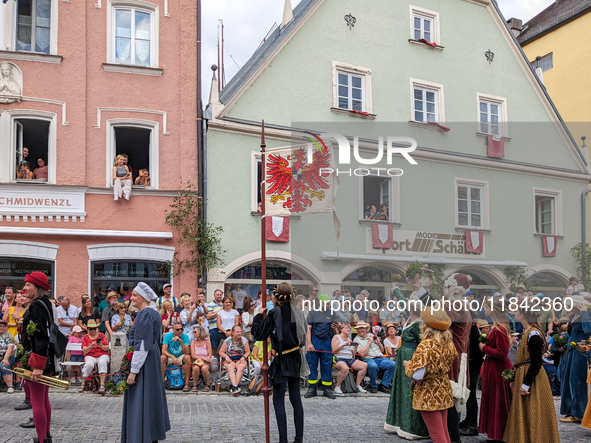 Over 2,000 participants recreate the medieval wedding of Hedwig Jagiellon and George of Bavaria. On July 16, 2023, in Landshut, Bavaria, Ger...