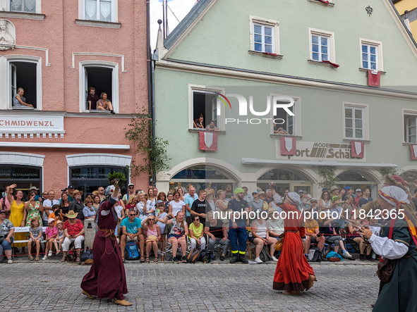 Over 2,000 participants recreate the medieval wedding of Hedwig Jagiellon and George of Bavaria. On July 16, 2023, in Landshut, Bavaria, Ger...