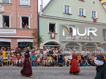 Over 2,000 participants recreate the medieval wedding of Hedwig Jagiellon and George of Bavaria. On July 16, 2023, in Landshut, Bavaria, Ger...